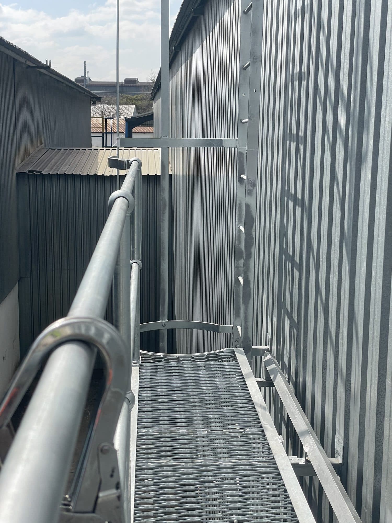 Rooftop walkway and handrail installation